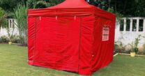 Canopy tent with sidewall doors