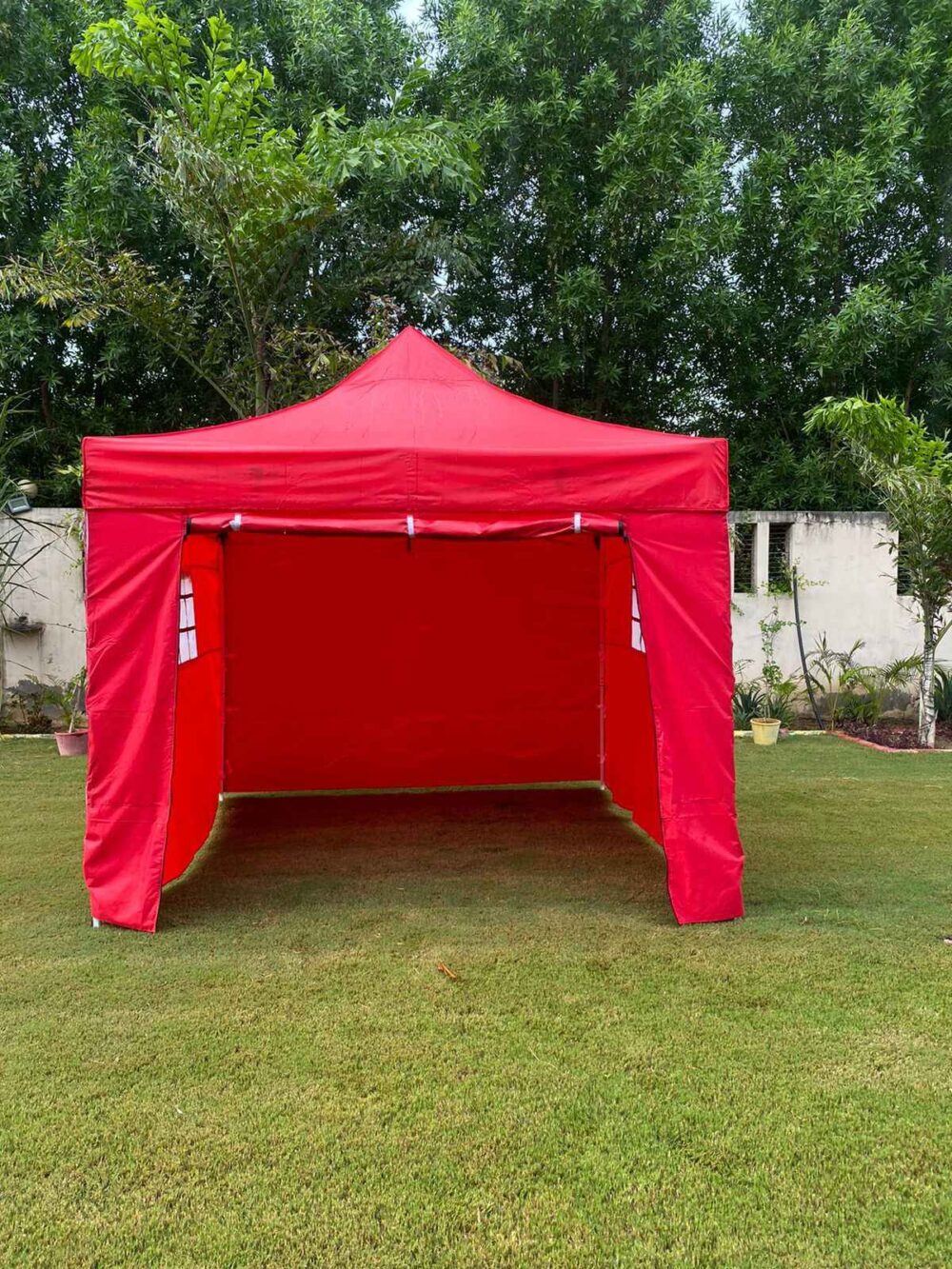 Canopies tents with sidewall doors